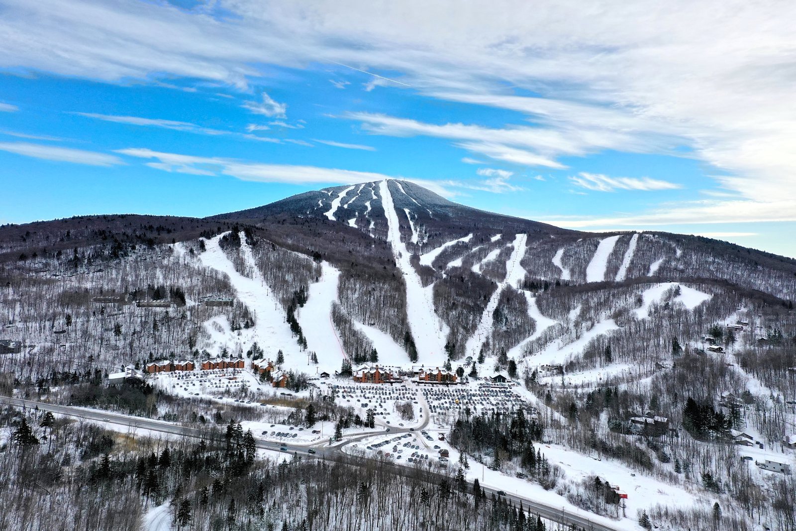Aerial winter view of Pico Mountain ski trails and base area